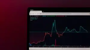 AI stock market correction fears shown on a declining stock chart on screen