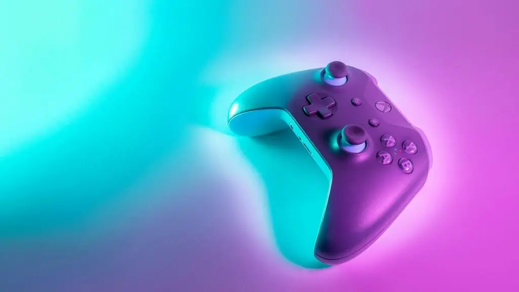 GameFi tokens earned through play showcased with a neon-lit game controller