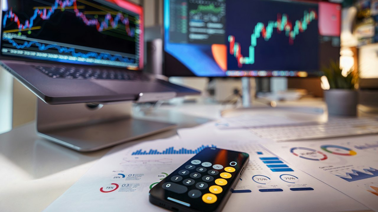Calculator and financial charts during the S&P 500 earnings season