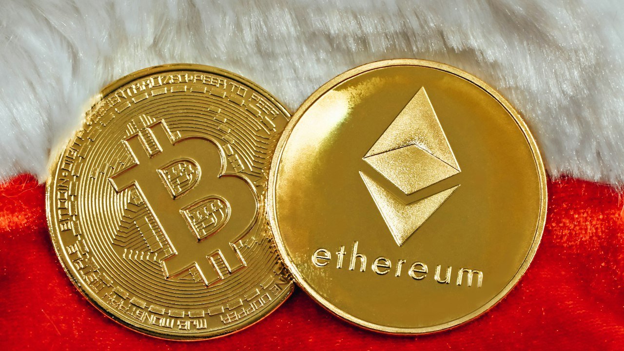 Gold cryptocurrency coin close-up illustrating ether ETF staking funds