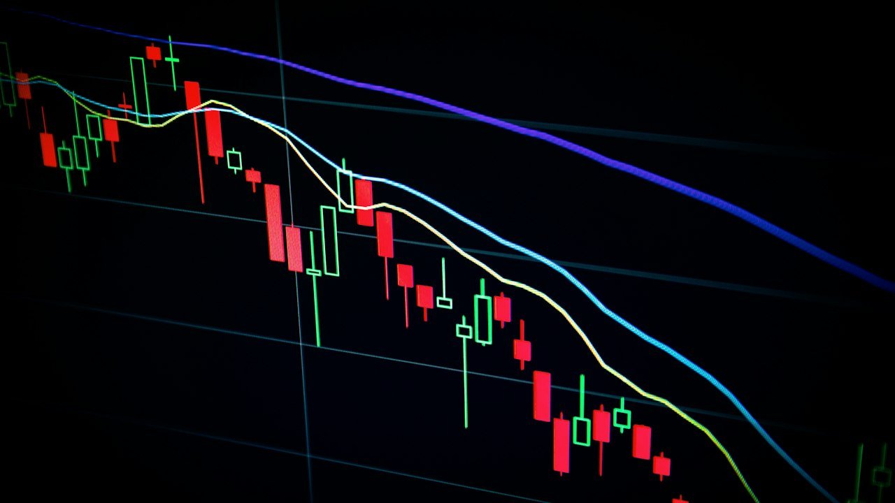 Pin bar candle stick pattern on a dark candlestick chart screen